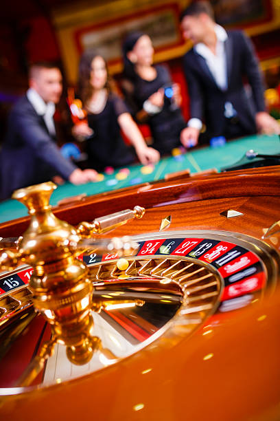 Adventures Beyond Wonderland live dealer table on ligamansion2 slot showing wheel and card draws